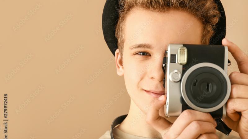 Teen taking a photo